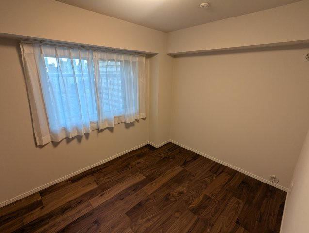 日商岩井木場マンションの洋室