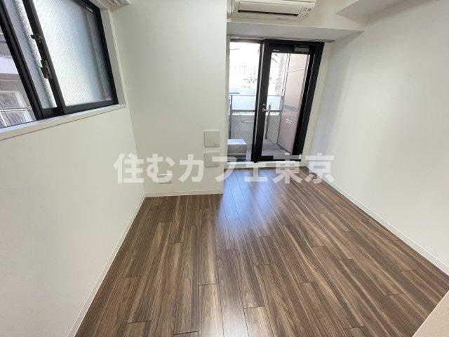 レジディア国立の洋室|落ち着いた色合いのお部屋です※別部屋写真