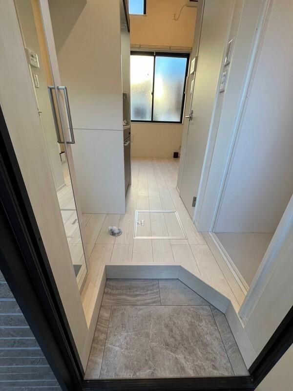 ハーモニーテラス王子本町の玄関