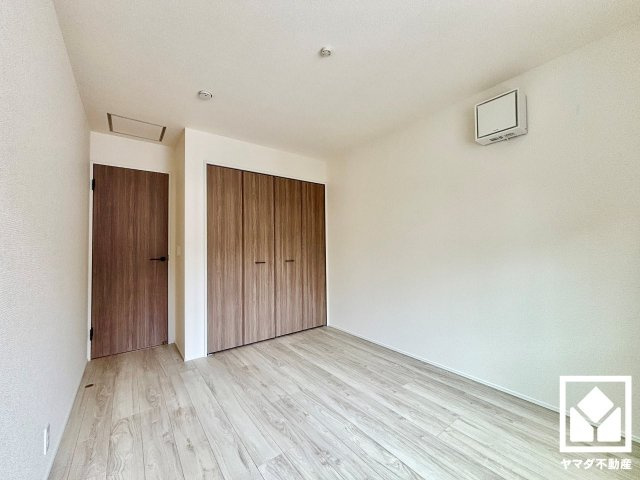 八幡市男山吉井　第１期１号棟の寝室