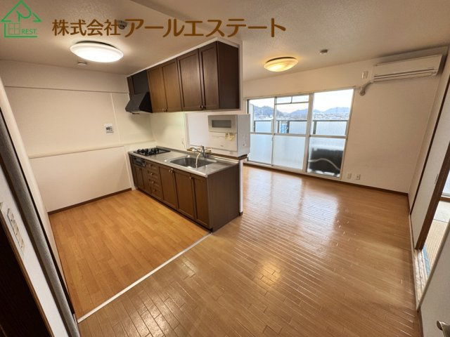 ネオハイツ花の北　JR播但線「野里駅」徒歩9分の居間・リビング