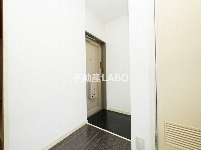 リアライズ平野西の玄関