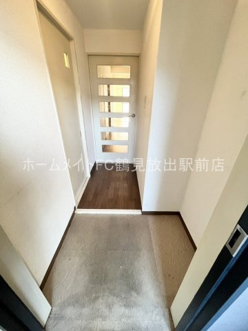 大東市諸福７丁目の賃貸マンションの玄関