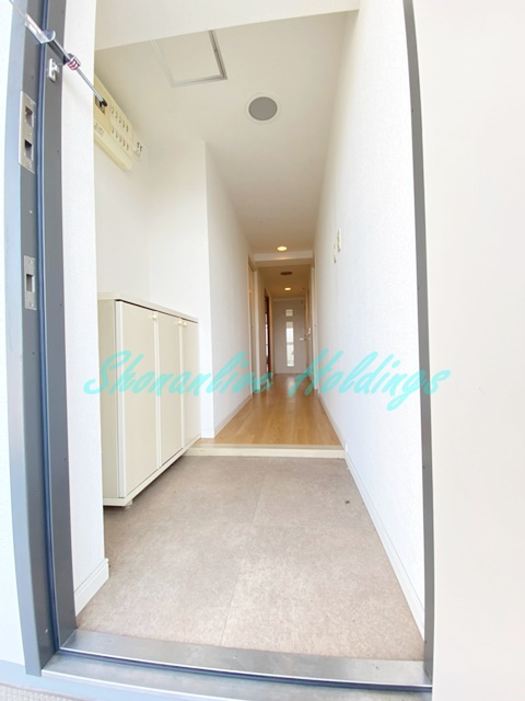 ラ・コスタ壱番館の玄関