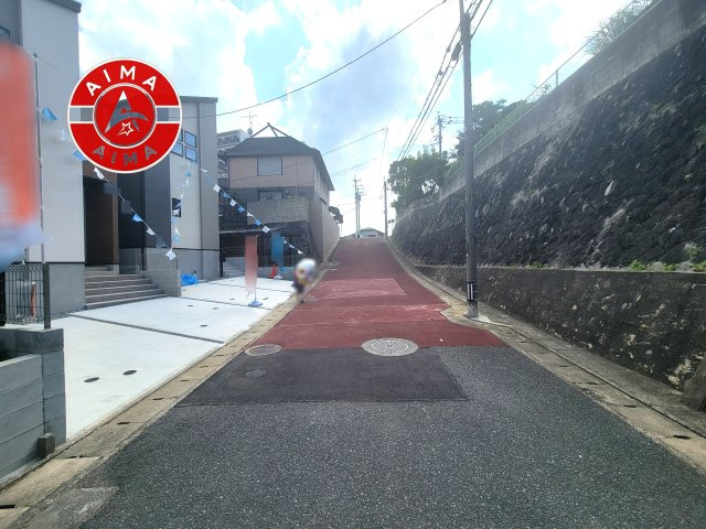 福岡市南区寺塚2丁目第1-2棟（2号棟）の外観|前面道路含む現地の写真です。
