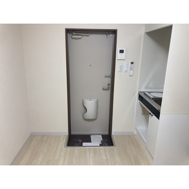 第100オーナーズビルの玄関