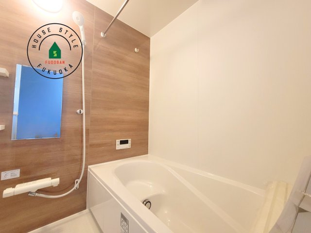 春日市須玖南7丁目第1-3棟（1号棟）の内観：施工例|1日の疲れを癒してくれる広々バスルーム。雨の日のお洗濯にも大活躍な浴室乾燥機付です！