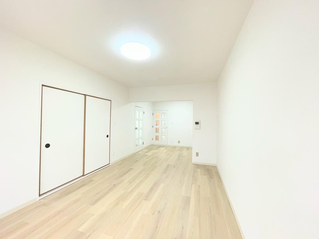 川越グリーンパークＭ－１号棟の居間・リビング