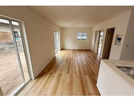 広島市安佐南区相田３丁目　新築一戸建ての居間・リビング