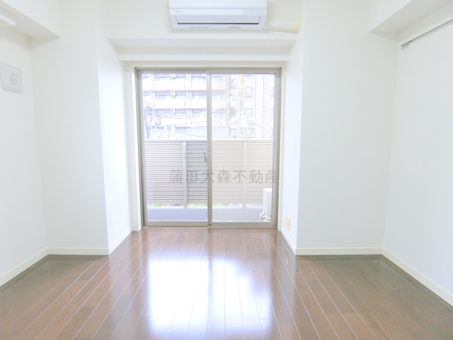 グランドコンシェルジュ蒲田イーストの居間・リビング