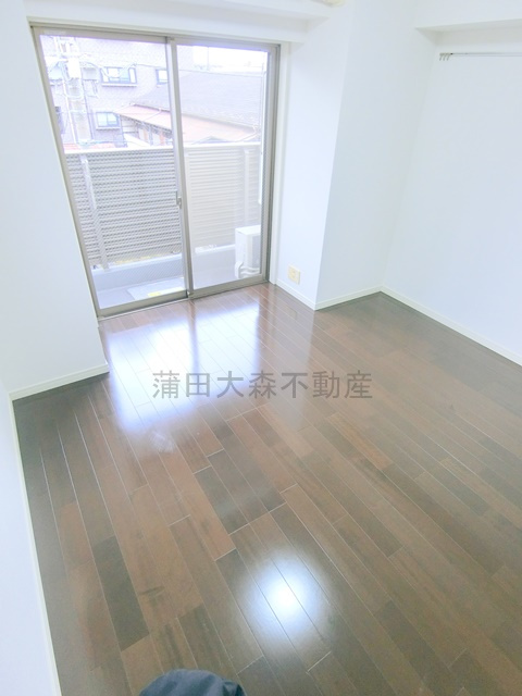 グランドコンシェルジュ蒲田イーストの居間・リビング