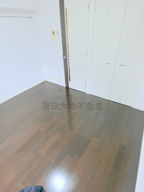 グランドコンシェルジュ蒲田イーストの居間・リビング