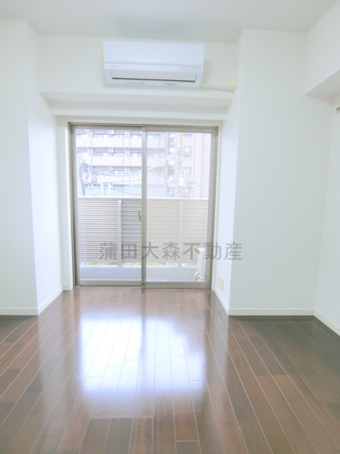 グランドコンシェルジュ蒲田イーストの居間・リビング|洋室