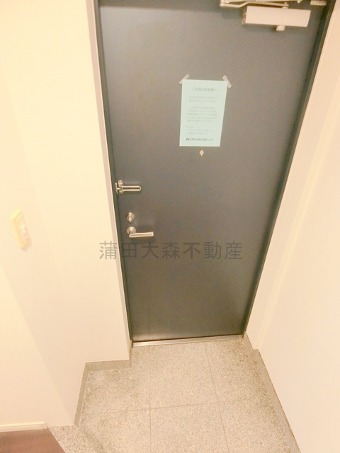 グランドコンシェルジュ蒲田イーストの玄関