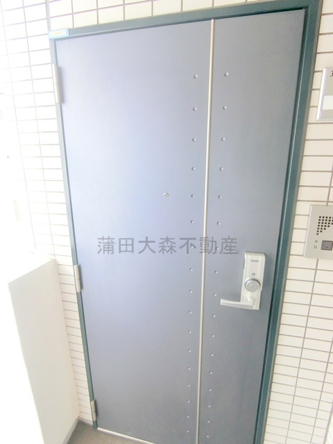 グランドコンシェルジュ蒲田イーストの玄関