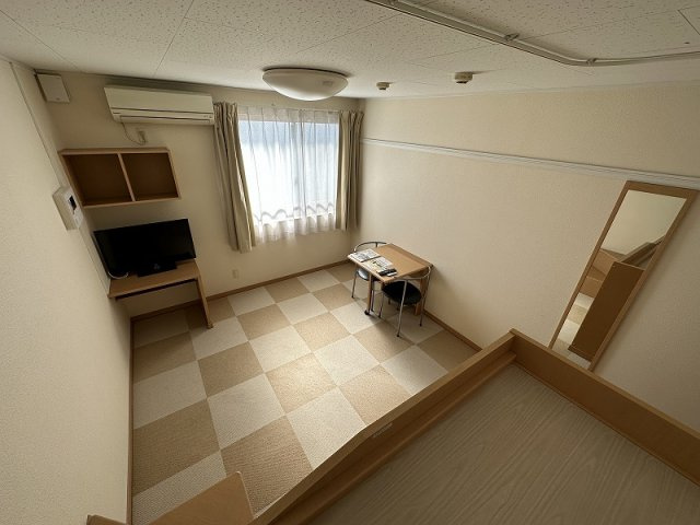 レオネクストグレースＫａｎｋｅの居間・リビング|寝室からの居間の景色