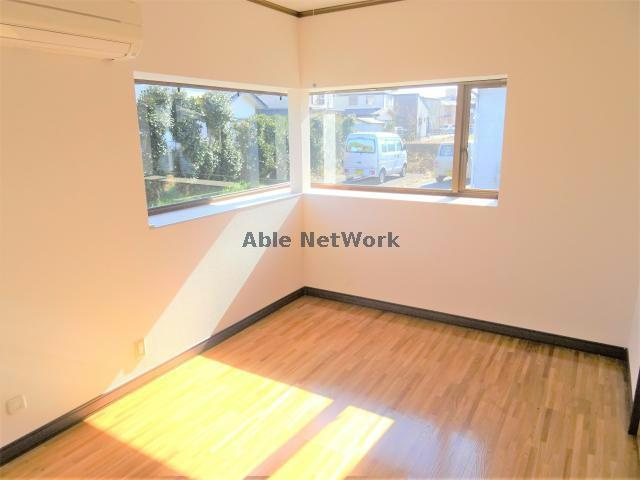 コスモス住宅の居間・リビング|6帖洋室