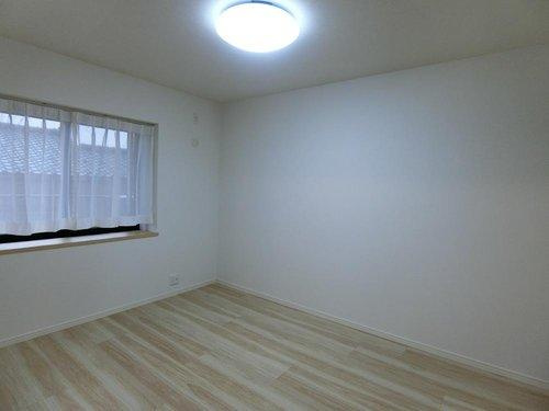 ベルシュ青山新町の洋室