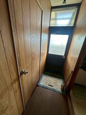 豊岡町長田　中古戸建の内装|廊下に勝手口があり洗濯物や庭の手入れに行けるので使い勝手が良いです。