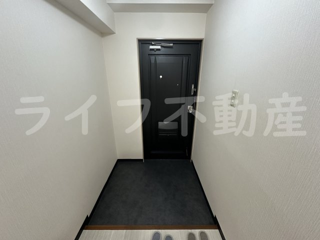 ナカトミサニーハイツの玄関