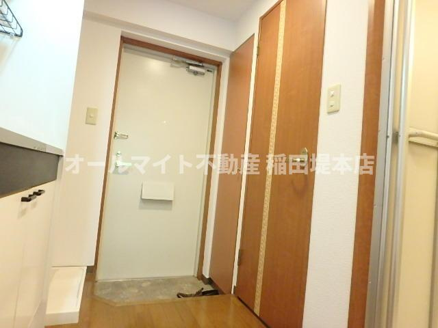 川崎市麻生区上麻生５丁目の賃貸マンションの玄関