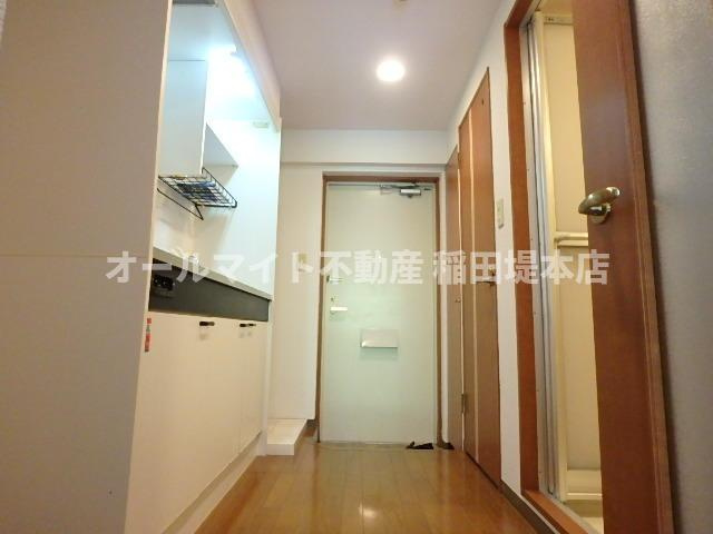 川崎市麻生区上麻生５丁目の賃貸マンションの玄関