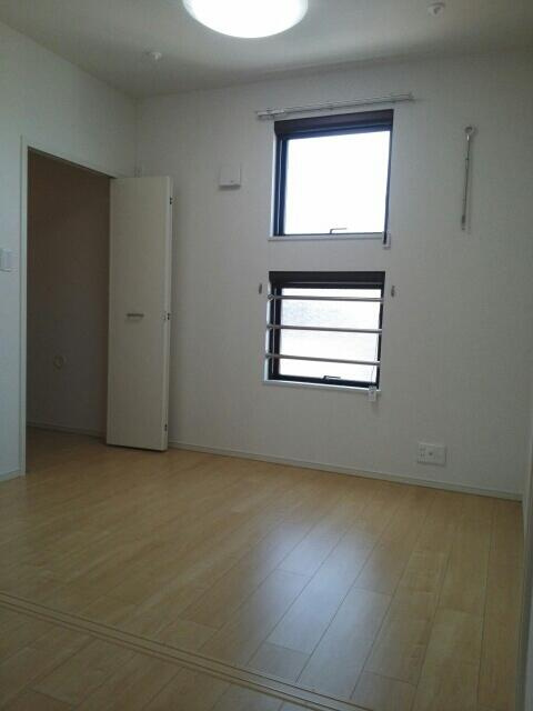 川崎市多摩区南生田１丁目のアパートの寝室