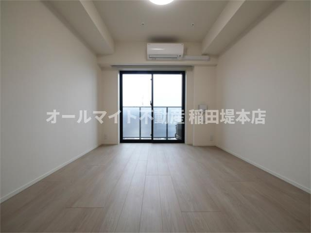 川崎市多摩区登戸新町の賃貸マンションの居間・リビング