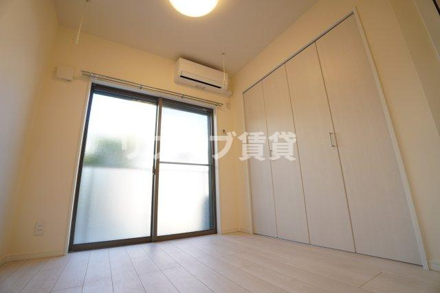 コモイルソーレ弁天の寝室