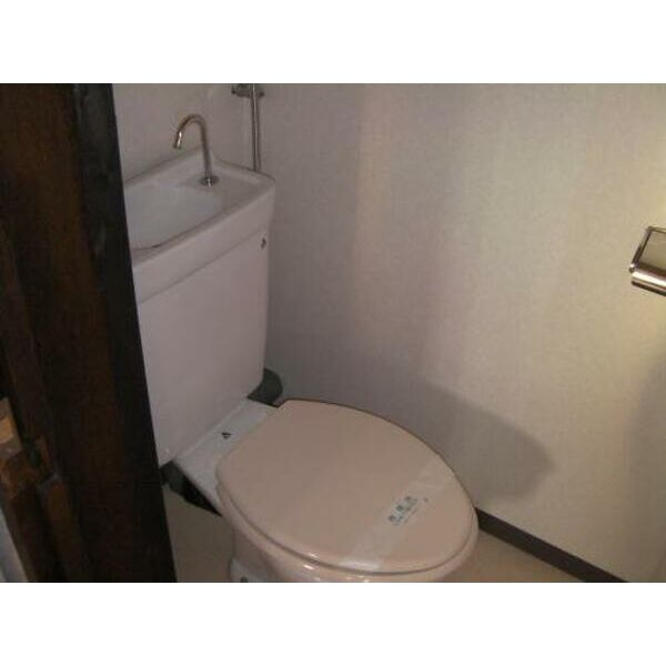 岸和田市吉井町１丁目の賃貸マンションのトイレ