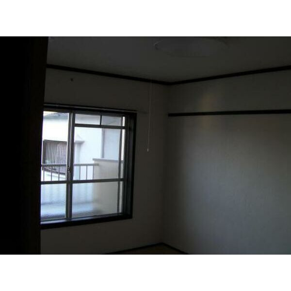 岸和田市吉井町１丁目の賃貸マンションの居間・リビング