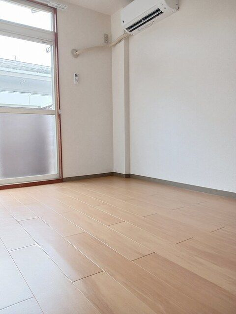 グリーンハイツⅠの寝室|落ち着いた色調の寝室です