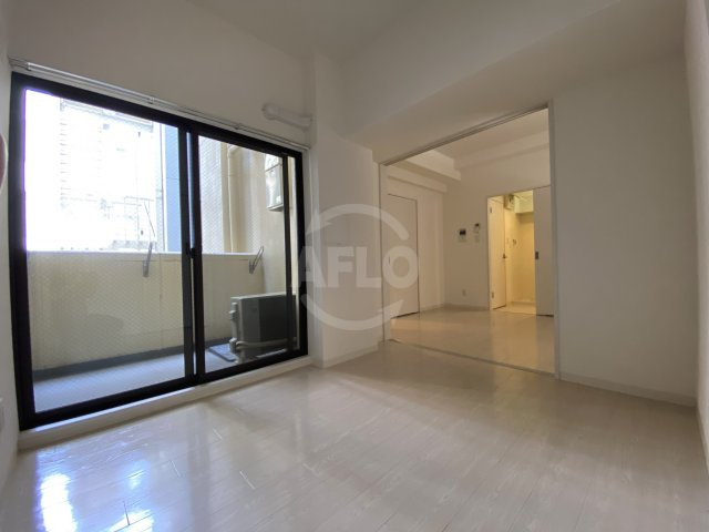 アモーレ本町ウエスト　明治小学校区の居間・リビング|AMORE HOMMACHI WEST（アモーレホンマチウエスト）　洋室