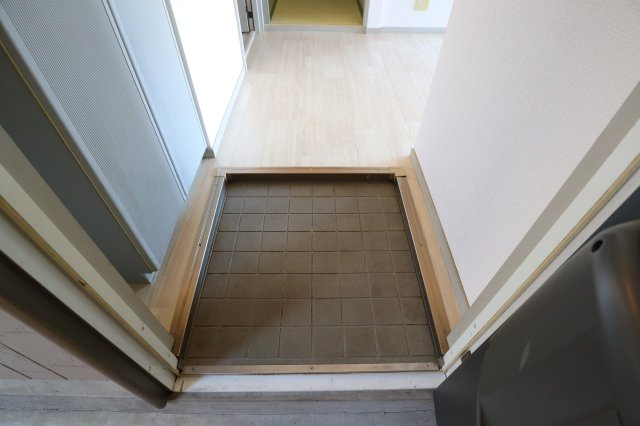 アルファ生駒の玄関