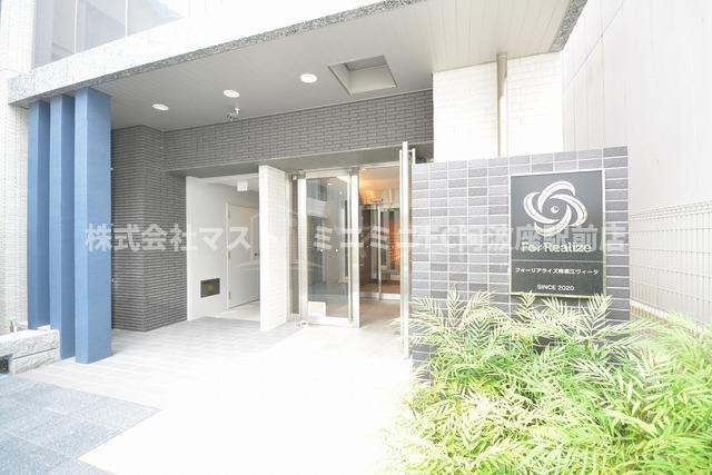フォーリアライズ南堀江ヴィータのエントランス
