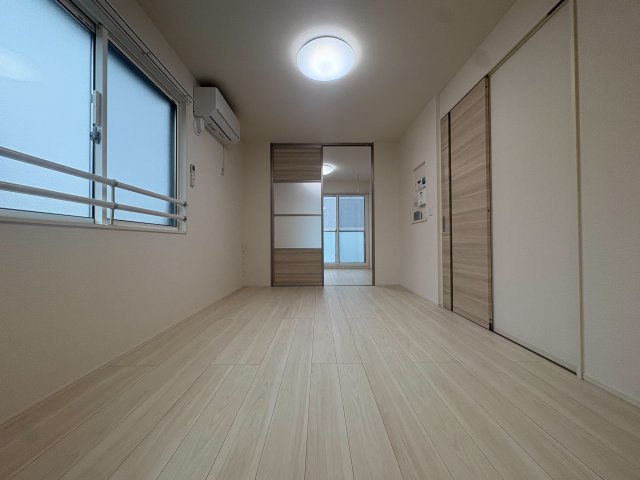 川崎市多摩区菅北浦１丁目のアパートの居間・リビング