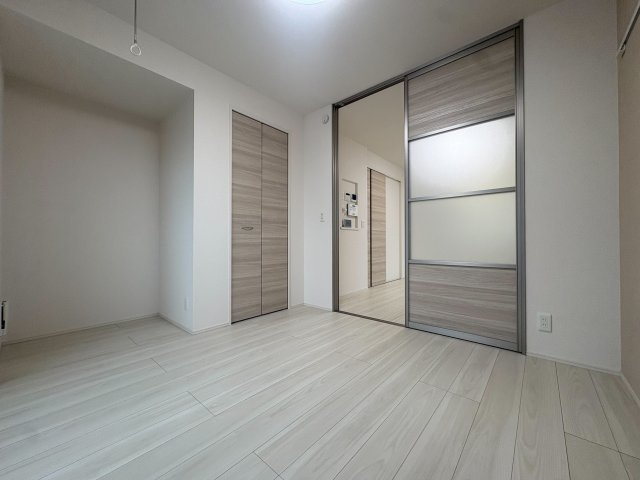 川崎市多摩区菅北浦１丁目のアパートの居間・リビング