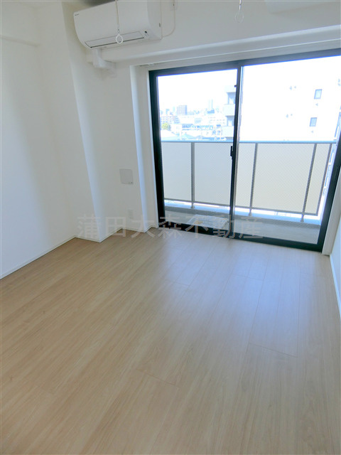 グラシアプレイス大森町の居間・リビング