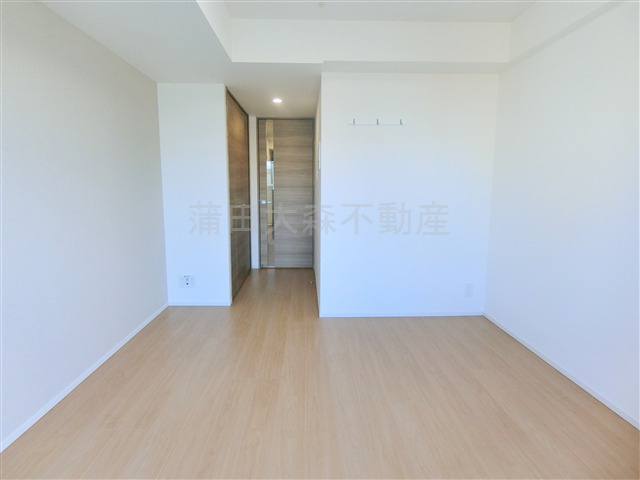 グラシアプレイス大森町の居間・リビング