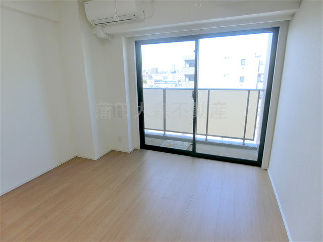 グラシアプレイス大森町の居間・リビング