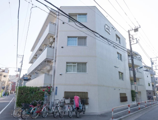 【外観】 | 駒込オリエントコート | モダンでスタイリッシュな印象を与える白色を基調とした外観。