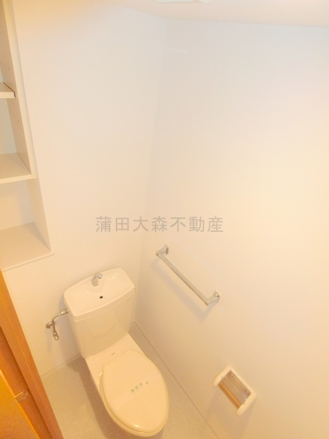 多摩川パークホームズのトイレ|棚付きのトイレ　