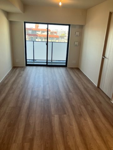 オープンハウスレジデンシア北綾瀬コートの居間・リビング