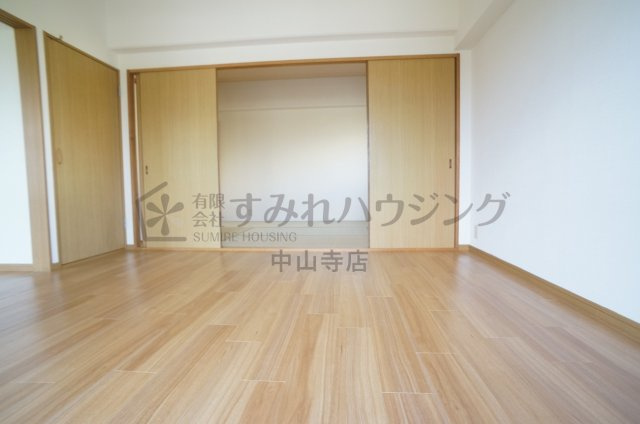 サニーハイツ（鴻池）の寝室