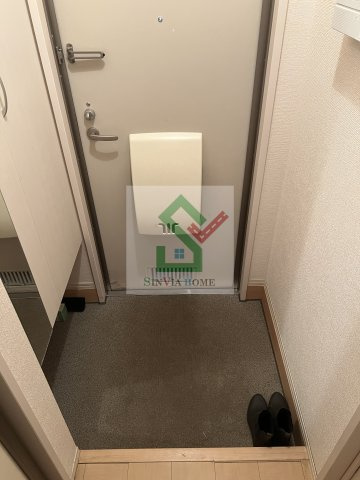 プレジール田無の玄関