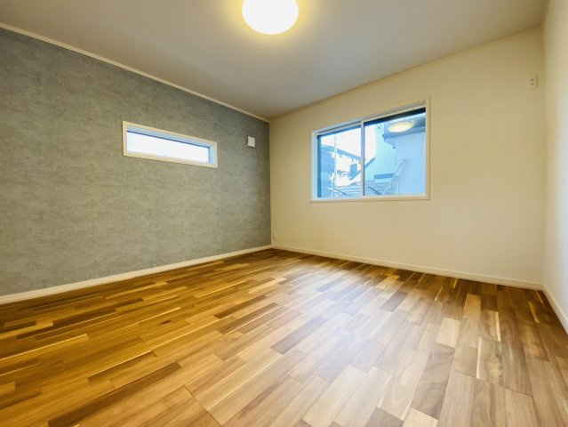 瑞穂市 別府（穂積駅） 3階建 の洋室|1階洋室