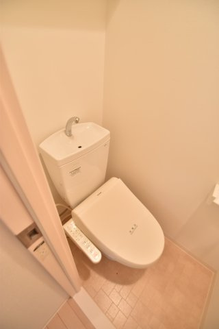 大阪市都島区中野町４丁目の賃貸マンションのトイレ