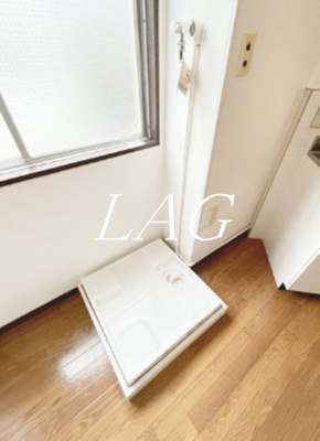 【設備】 | 峰マンション | 室内洗濯機置き場です。