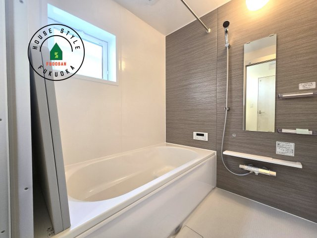 福岡市城南区七隈3丁目第1-3棟（2号棟）の内観：施工例|1日の疲れを癒してくれる広々バスルーム。雨の日のお洗濯にも大活躍な浴室乾燥機付です！