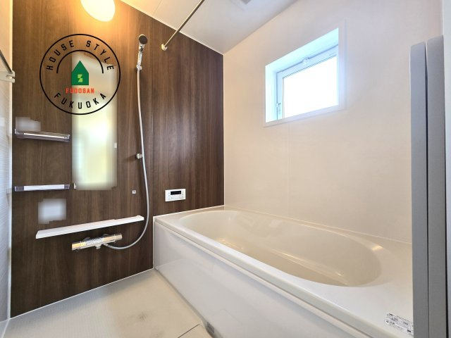 福岡市城南区七隈3丁目第1-3棟（3号棟）の内観：施工例|1日の疲れを癒してくれる広々バスルーム。雨の日のお洗濯にも大活躍な浴室乾燥機付です！